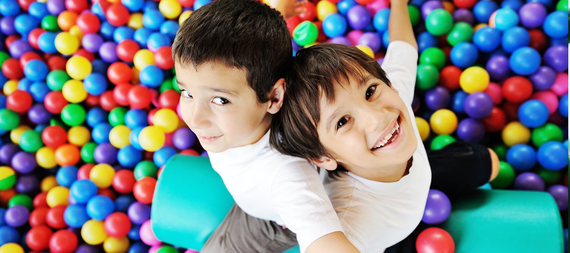 Boys in ballpit - Pediatric Dentist in Madison, MS